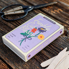 Freshly Cut Blooms seed kit box with six white birch garden markers and vintage scissors on a wooden table.