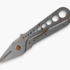 Stainless steel Herb Harvest and Strip Tool with copper accents, featuring integrated herb stripping holes and a safety latch.