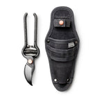 Steel Garden Pruner with copper accents and a black waxed canvas storage sheath.