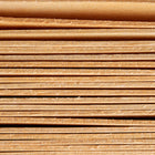 Stack of smooth, light-colored 6-inch wooden seed starting labels made from birch veneer.